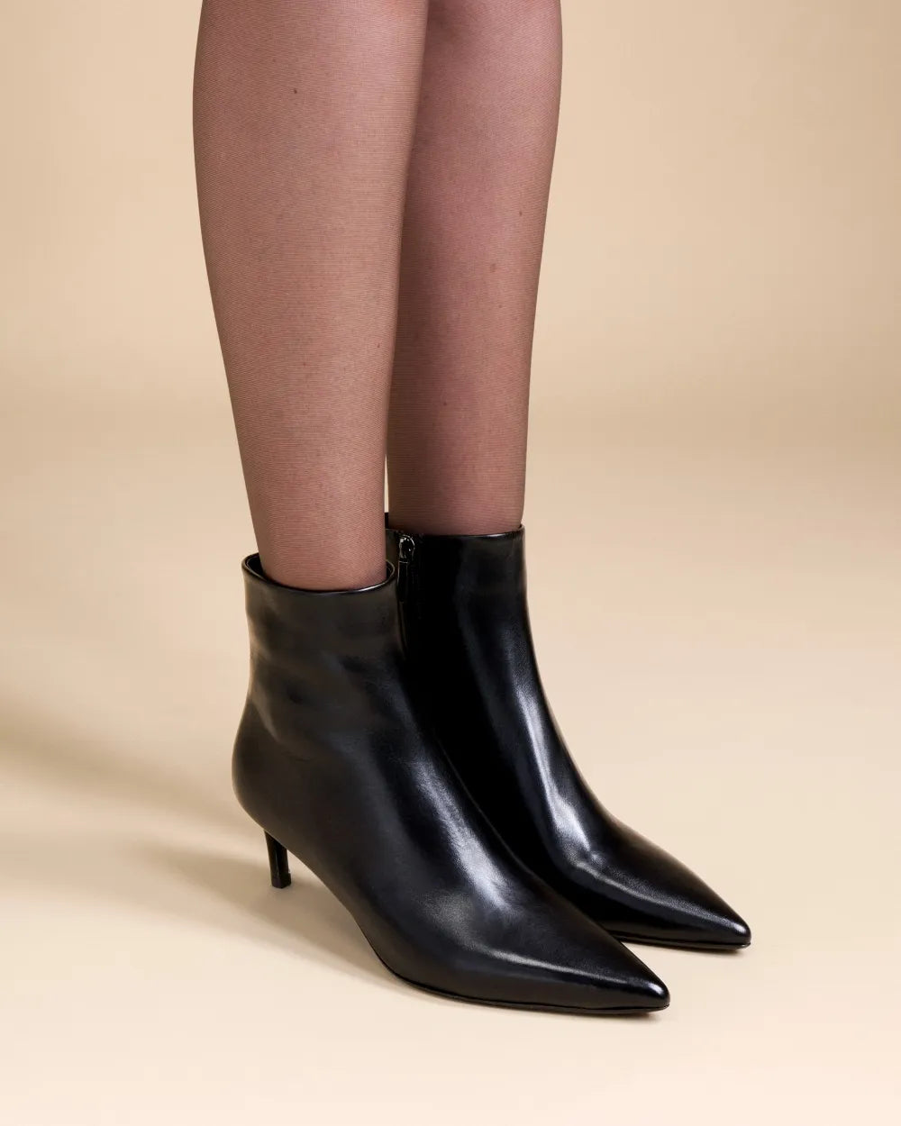 Noura Low Ankle Boots with Pointed Toe in Black Leather
