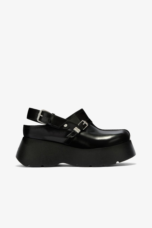 Platform Clogs in Black Oleatex